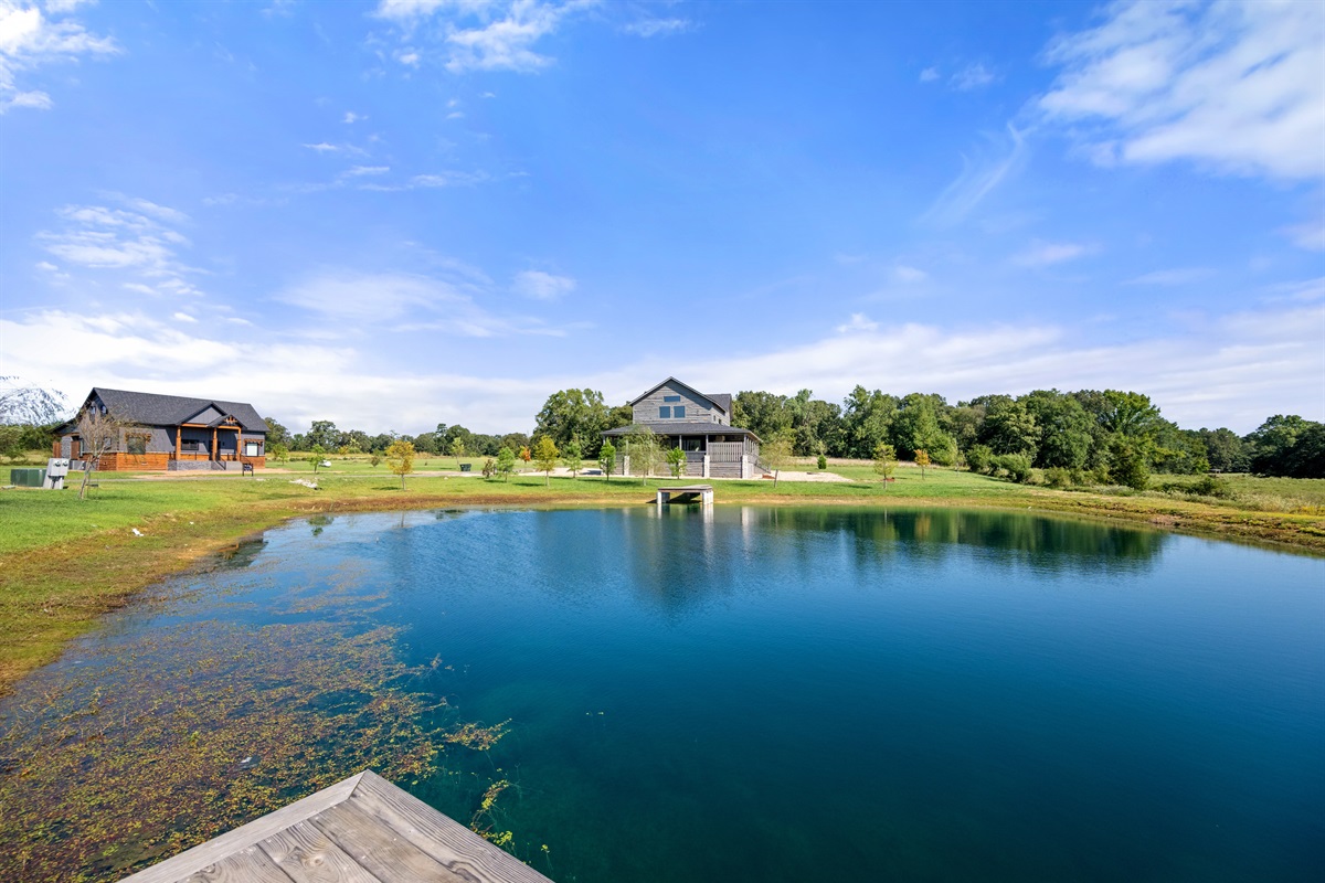 Pondside views with private dock and wide-open skies.