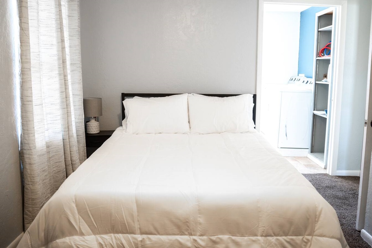 Inviting queen bedroom—perfect for friends, family, or extra guests.