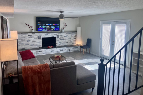 Call it a den or a living room; either way you can chill! Opens out to back yard. (No landscape out there yet). Extra beds and sleeping space available- just ask us. 
