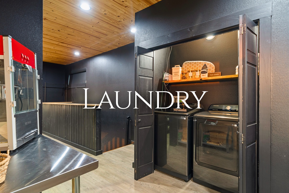 The laundry closet is equipped with modern appliances and ample storage, making longer stays easy and convenient.