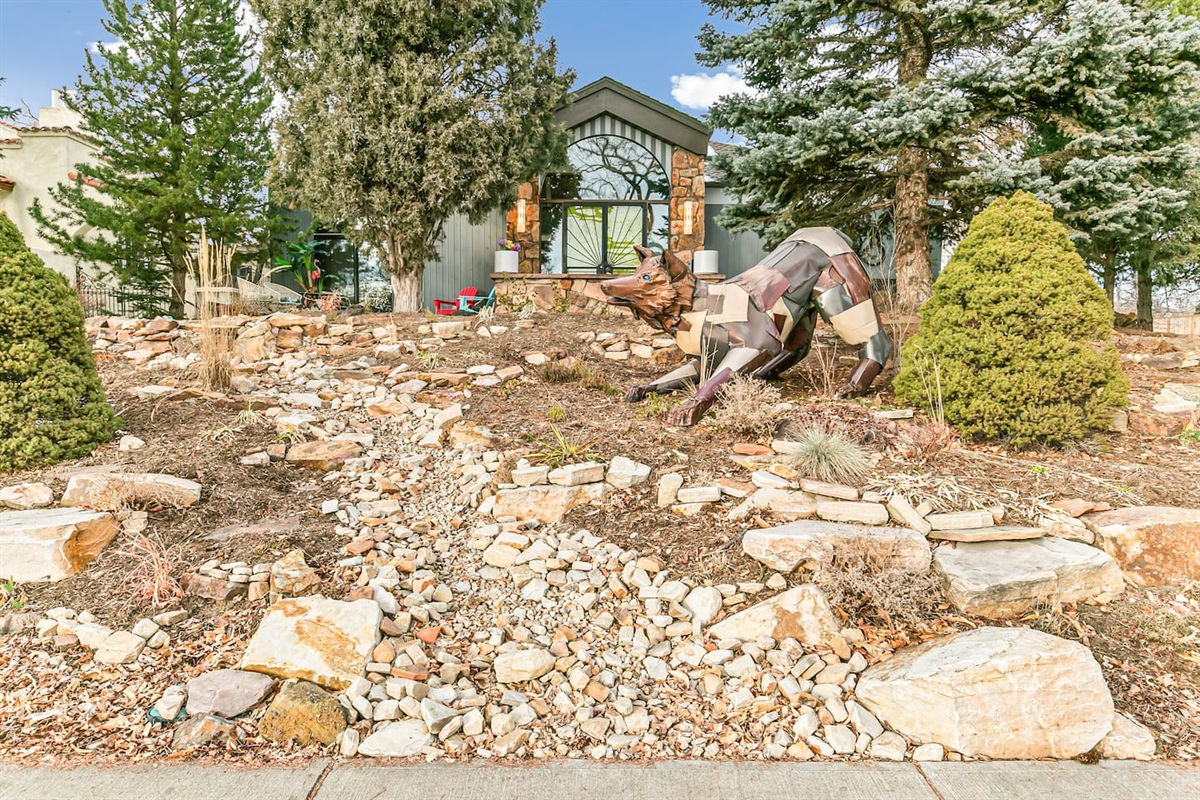 Front door, featuring an artistic fox sculpture. 