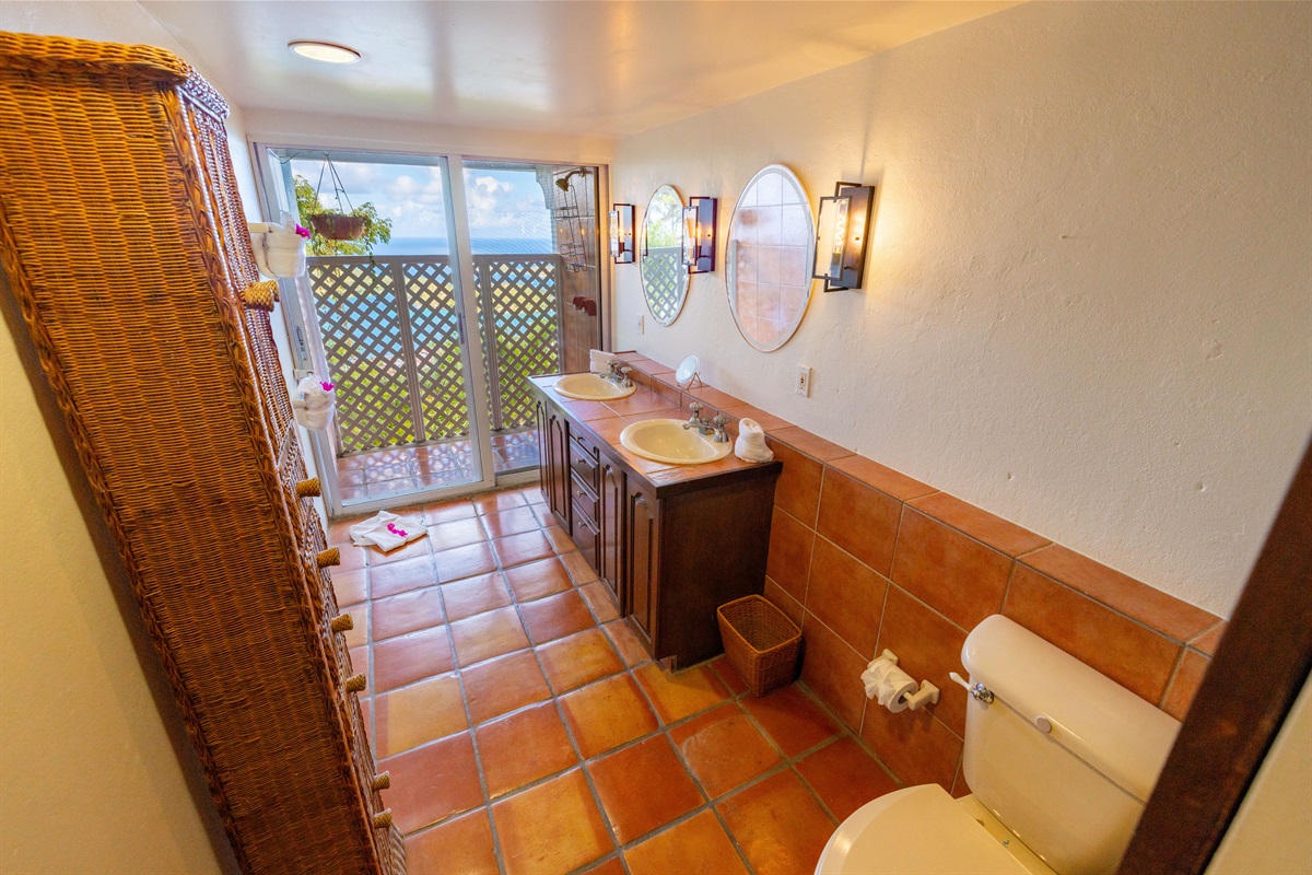 Guest suite 1 ensuite bathroom has a shower that still gives you views
