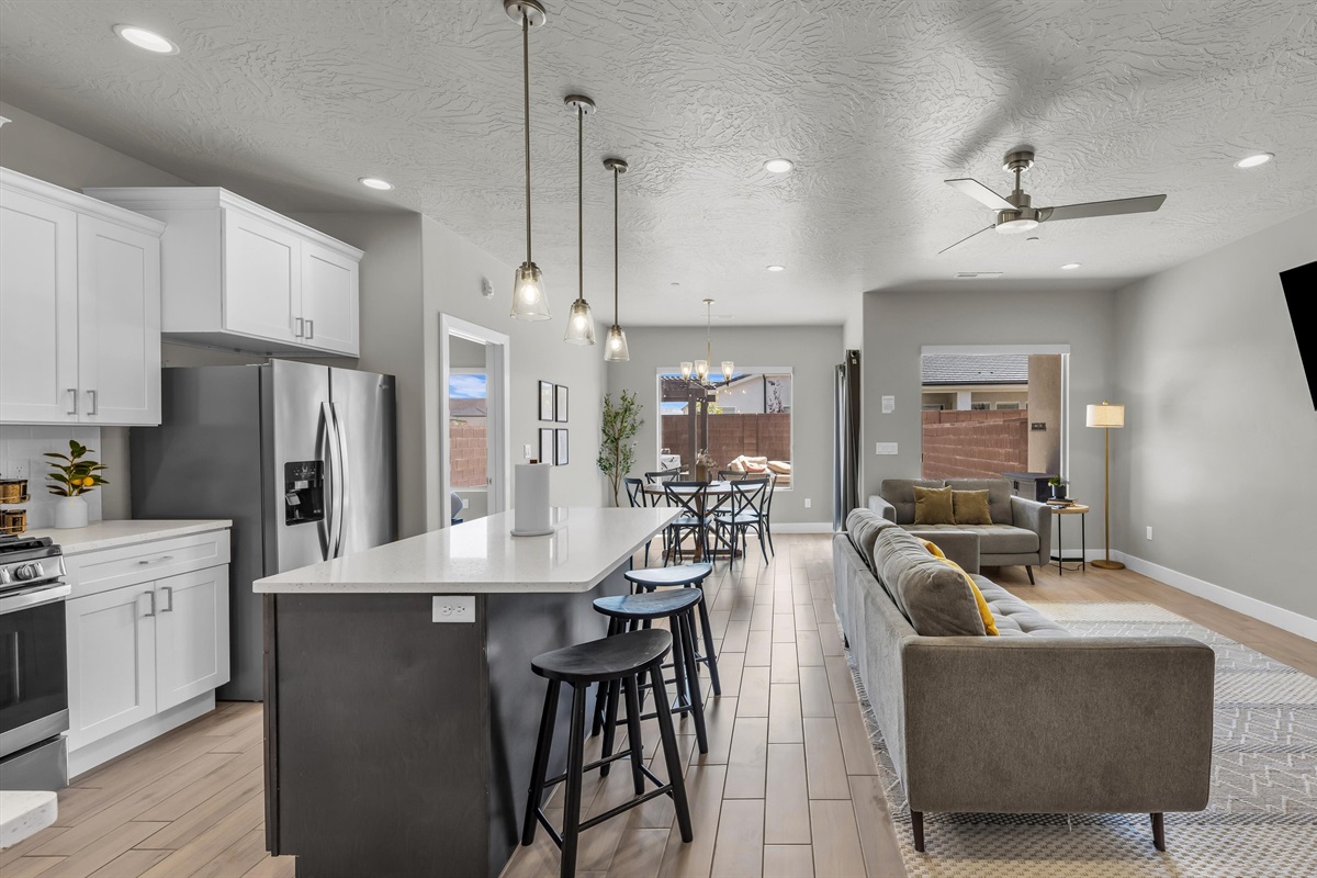 Open-Concept Kitchen Island Flowing to Living Area