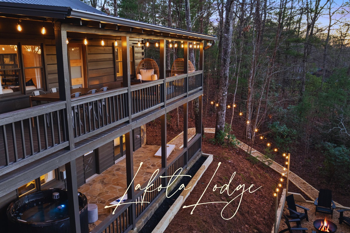 Welcome to Lakota Lodge! Gather in the spacious living room for family time, board games, or simply unwinding by the wood burning fire place.