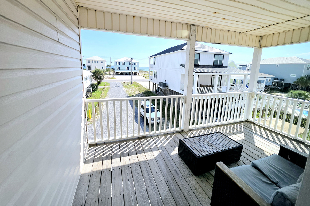 Covered balcony with neighborhood views