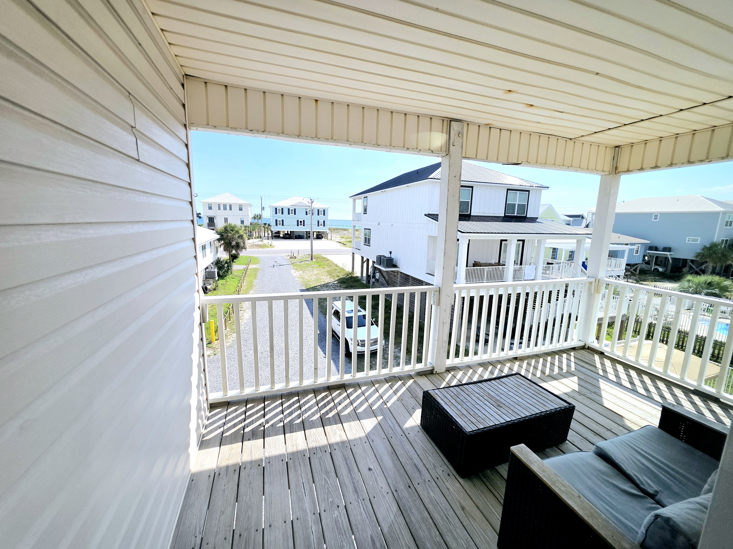 Covered balcony with neighborhood views