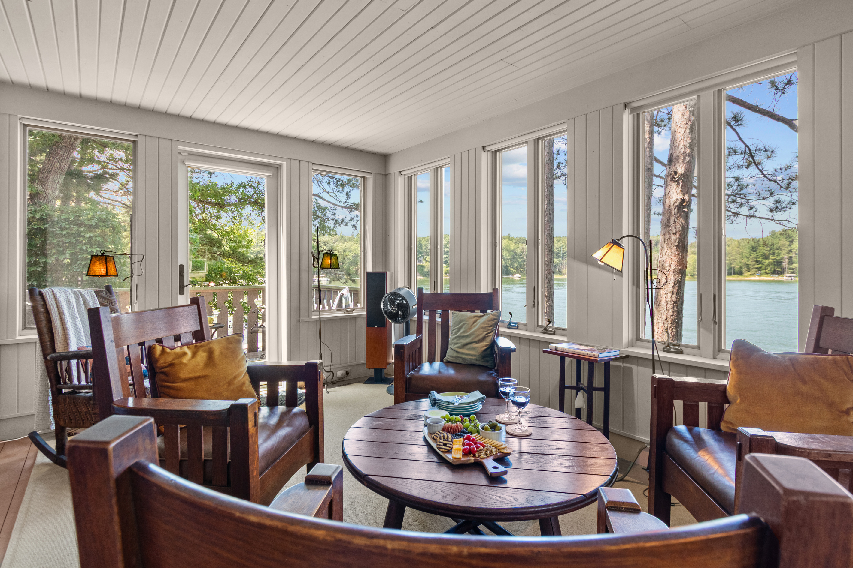 Settle into the comfortable chairs, turn on the warm lamps, and enjoy good conversation surrounded by windows and peaceful lake views.