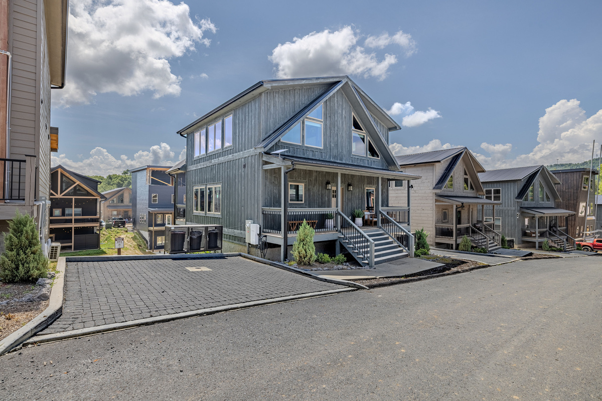 An exterior view of Skyfire within the surrounding cabin community.