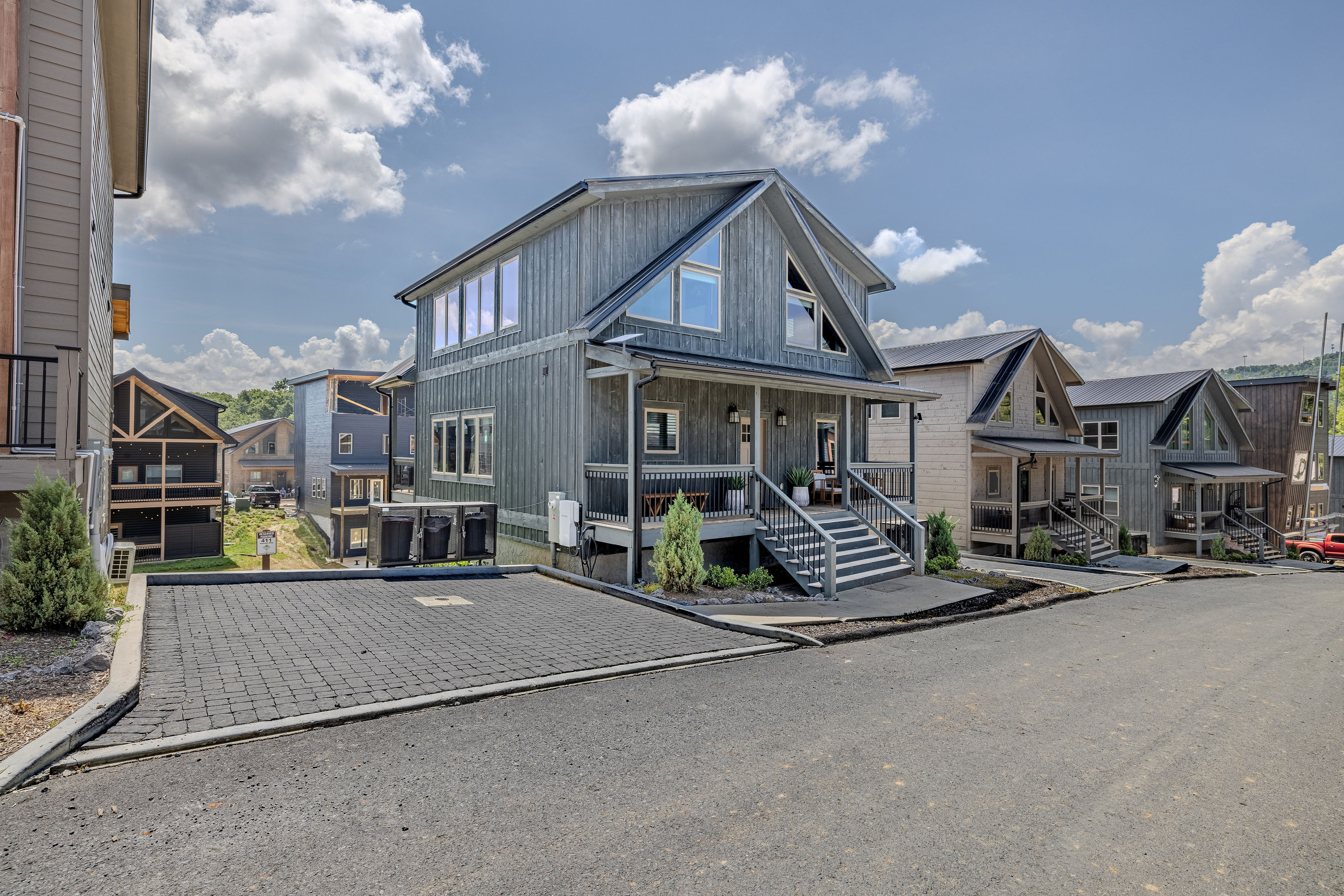 An exterior view of Skyfire within the surrounding cabin community.
