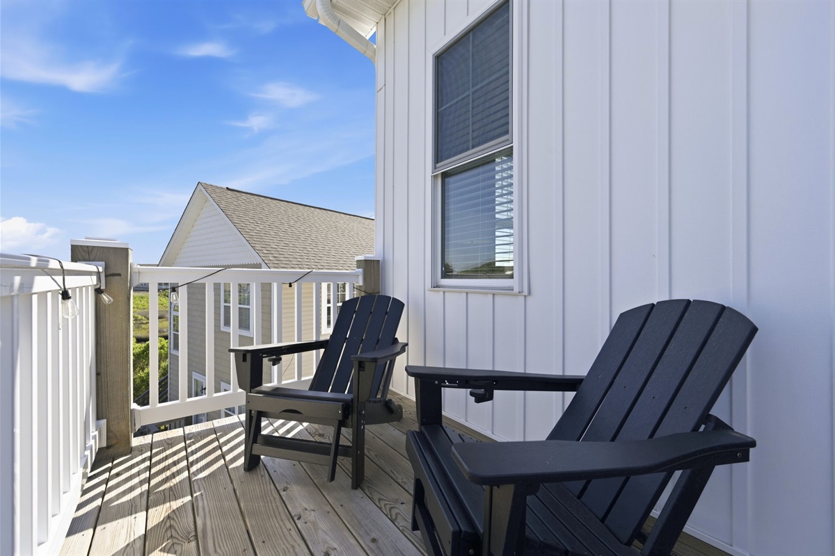 Sneak away to a quiet balcony and enjoy the coastal breeze