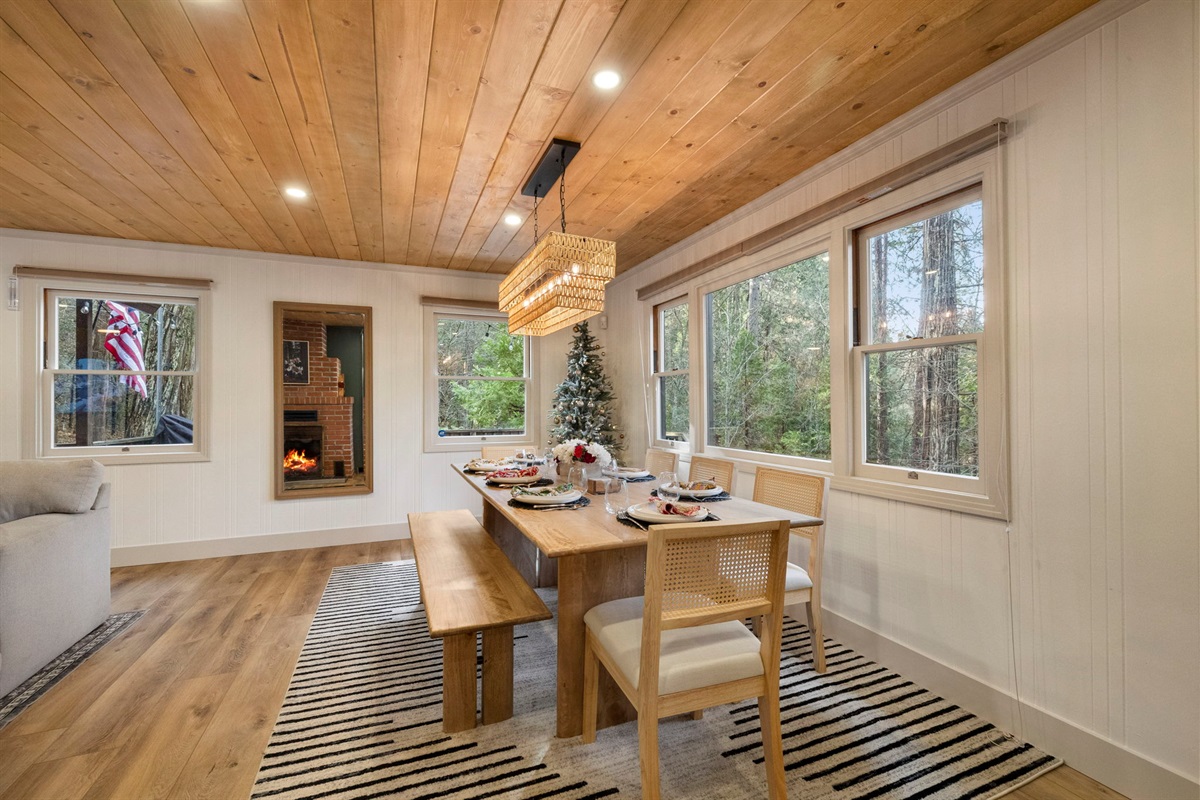 Dining table for up to 10. Up to 6 chairs and a large bench is available for seating. Plenty of dishes for your large groups as well. The most beautiful views to enjoy.