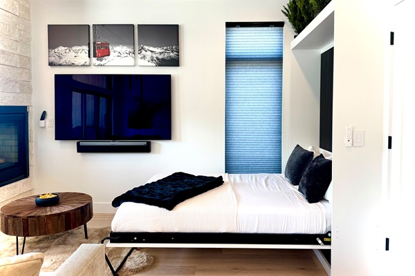 Full sized Murphy bed folds flush to the wall when you aren’t using it.  Very simple process!