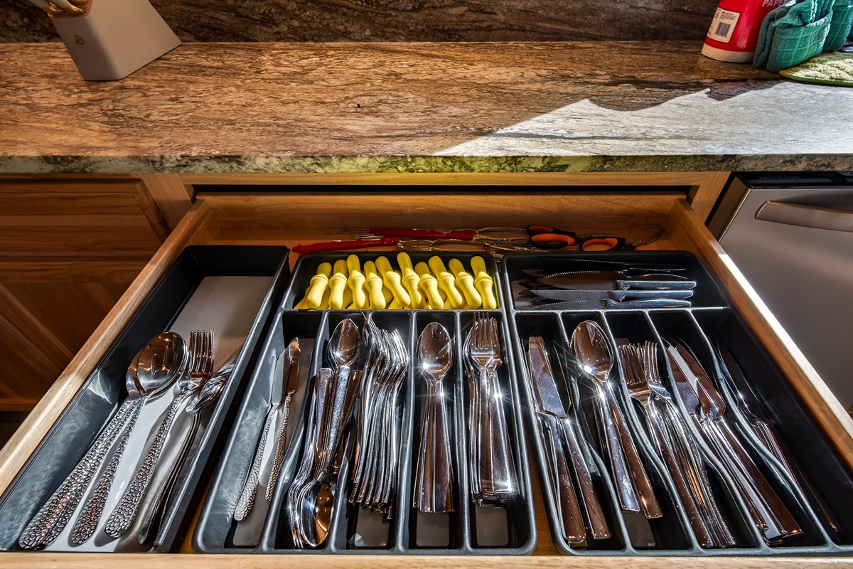 Silverware so that everyone in the group can eat at the same time and a load in the dishwasher! Corn on the cob holders, seafood utensils - shell cracker, shellers, crab forks, scissors and of course steak knives!