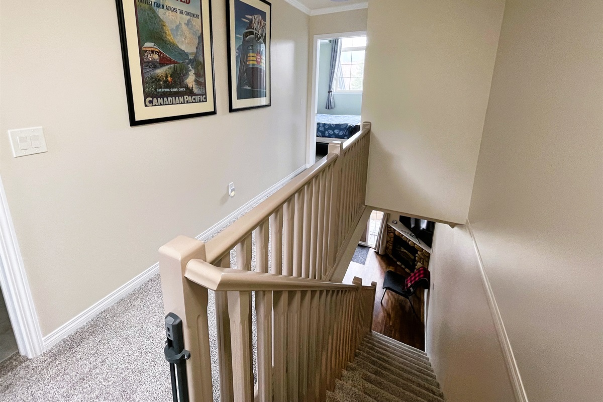 2 bedrooms, and 2 bathrooms on upper floor.  Optional child gate at top of the stairs.
