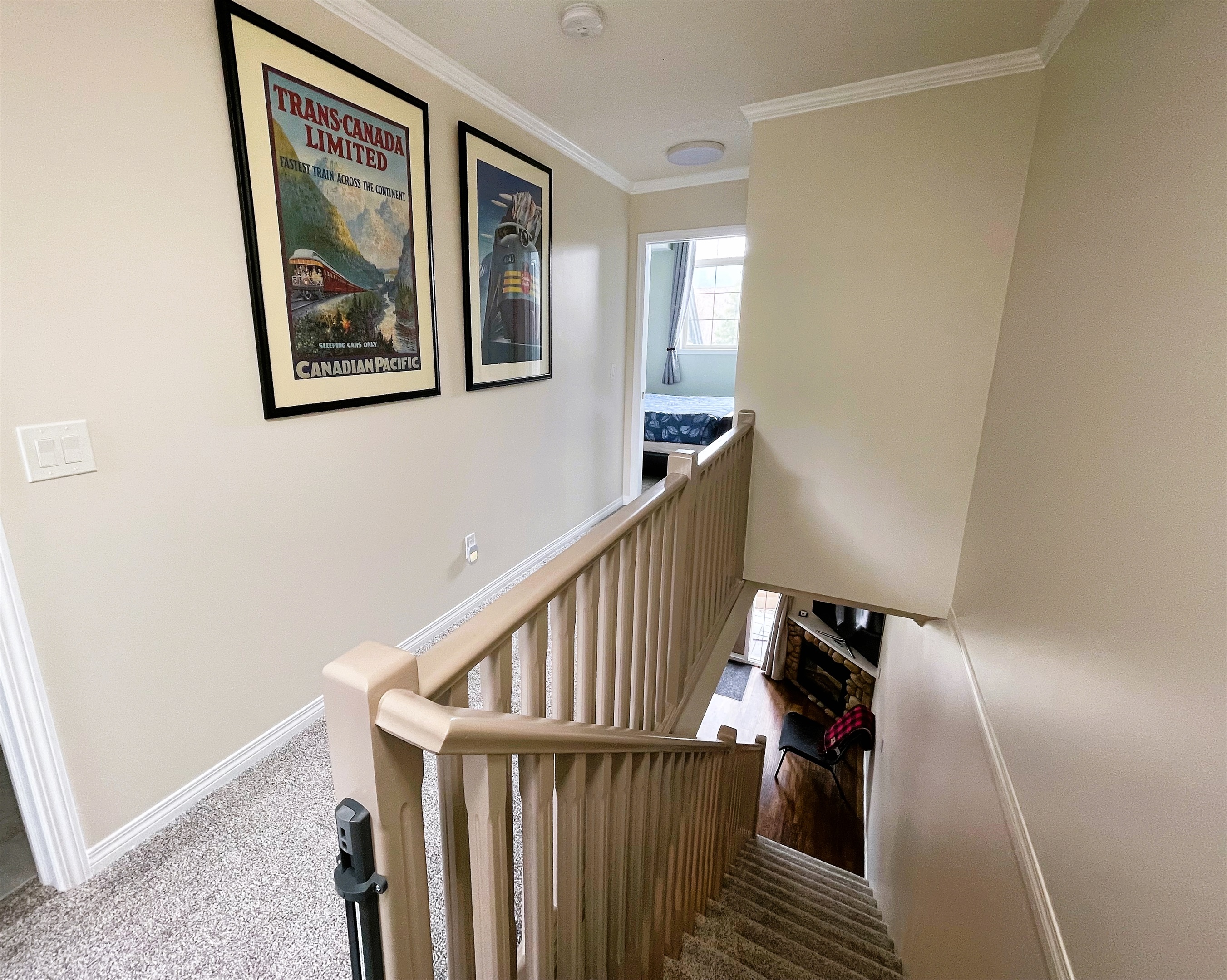 2 bedrooms, and 2 bathrooms on upper floor.  Optional child gate at top of the stairs.