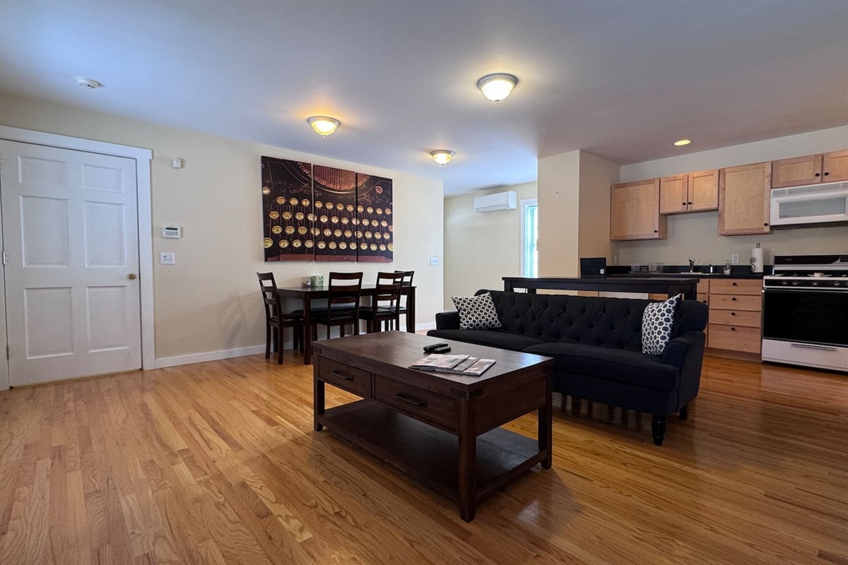 Open-concept apartment with Living room, kitchen, and dining area