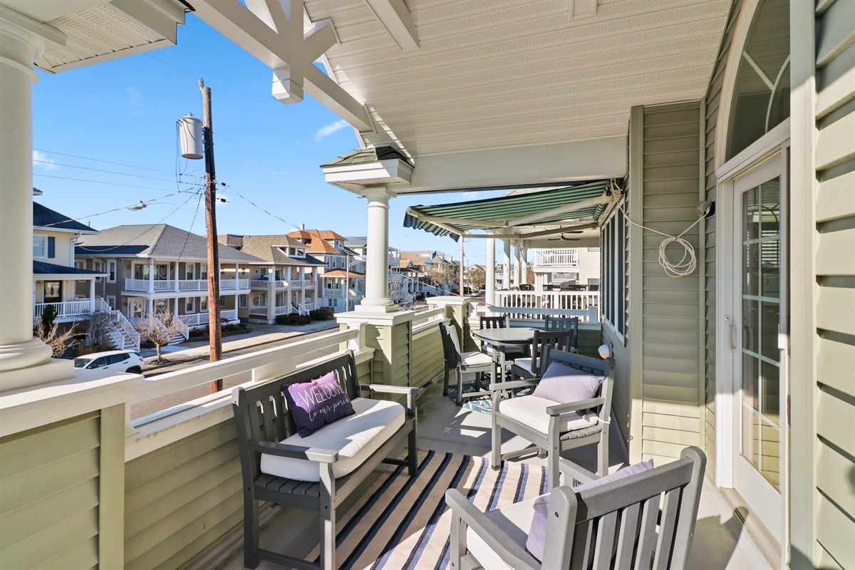 Relax and unwind on a balcony with multiple seating