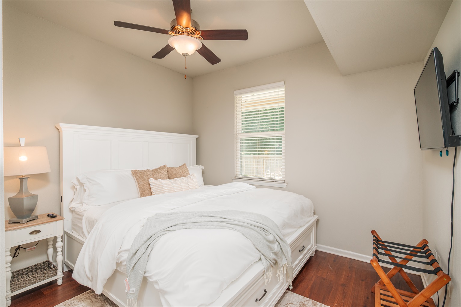 Stretch out in the king suite with a private bath and TV — your own retreat for recharging after exploring Starkville.