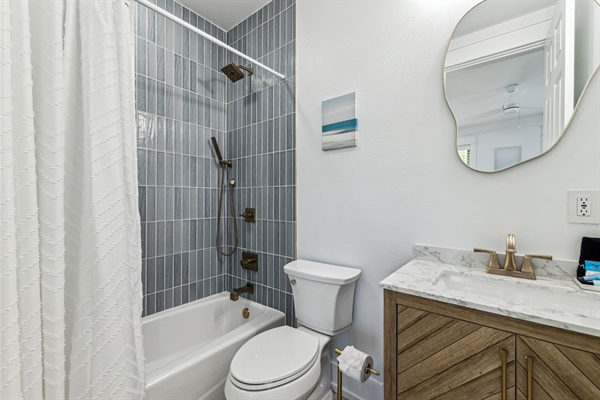 Second Floor-Bathroom 3 (connected to bedroom 3)  Amenities include:  travel-size shampoo & conditioner, small bar of hand soap, individual-wrapped cotton swabs-4 count, 2 makeup removal microfiber towels, and a mat for hot tools.  