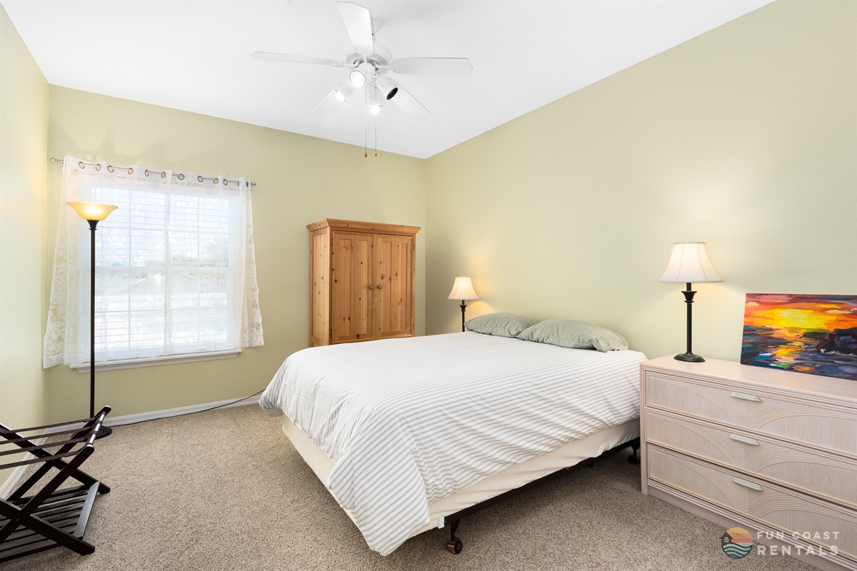 Master bedroom with Queen bed and ensuite full bathroom.