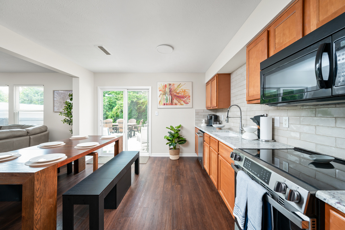 The open-concept kitchen keeps everyone connected, whether you're preparing a meal, grabbing a quick snack, or gathering with family and friends before heading out for the day.