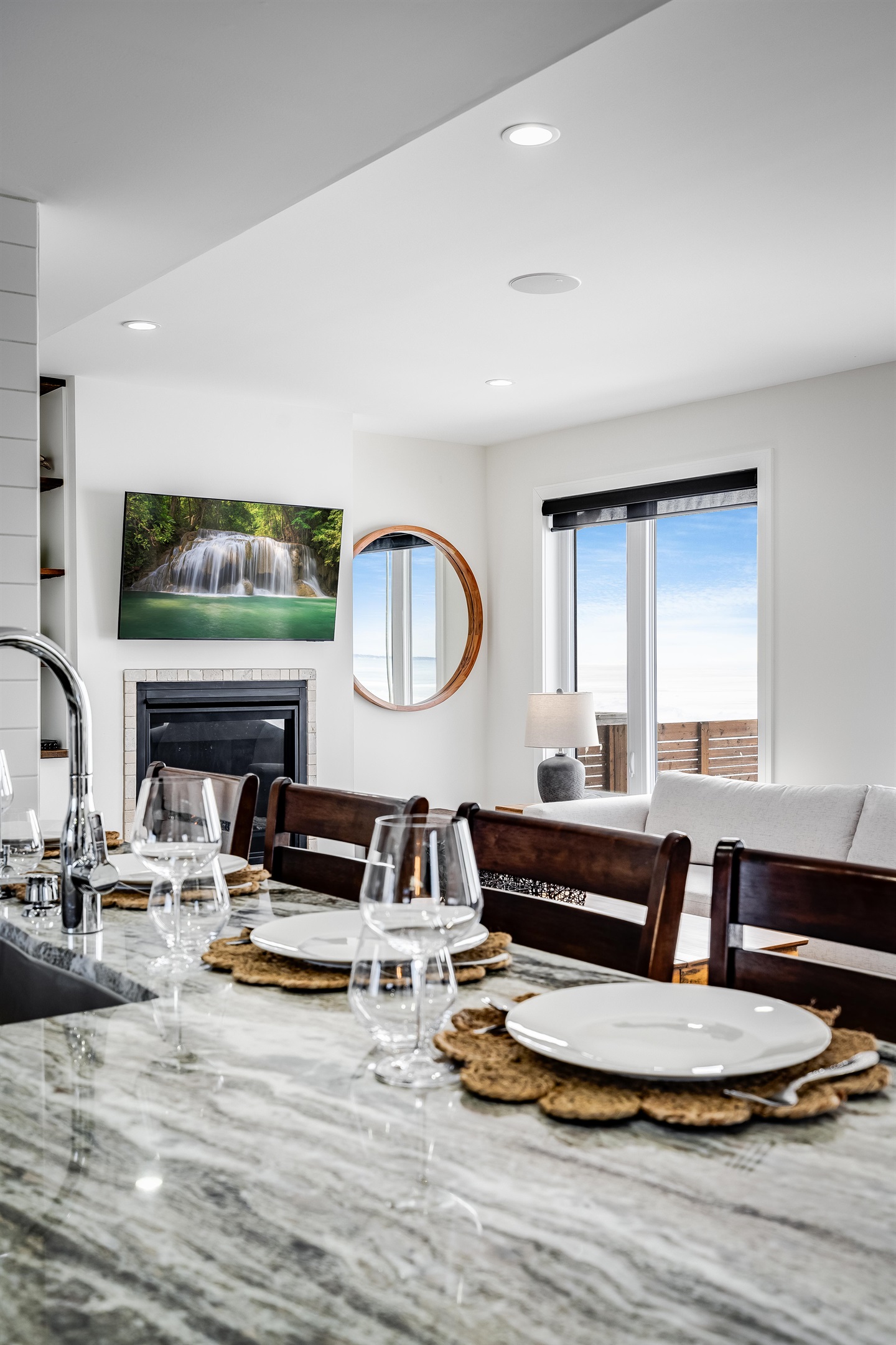 White-washed walls enhance warm wood furniture.