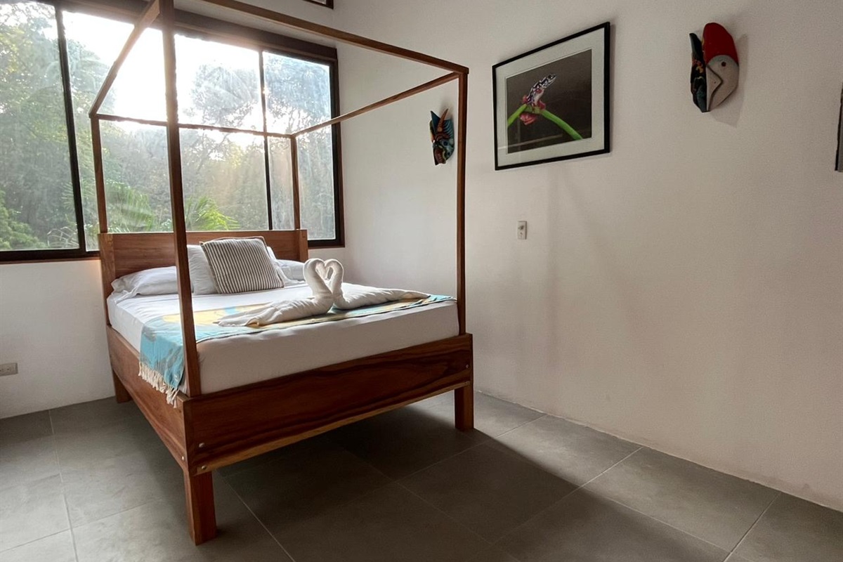 Serenely surrounded by trees in the master suite of Casa Mono.