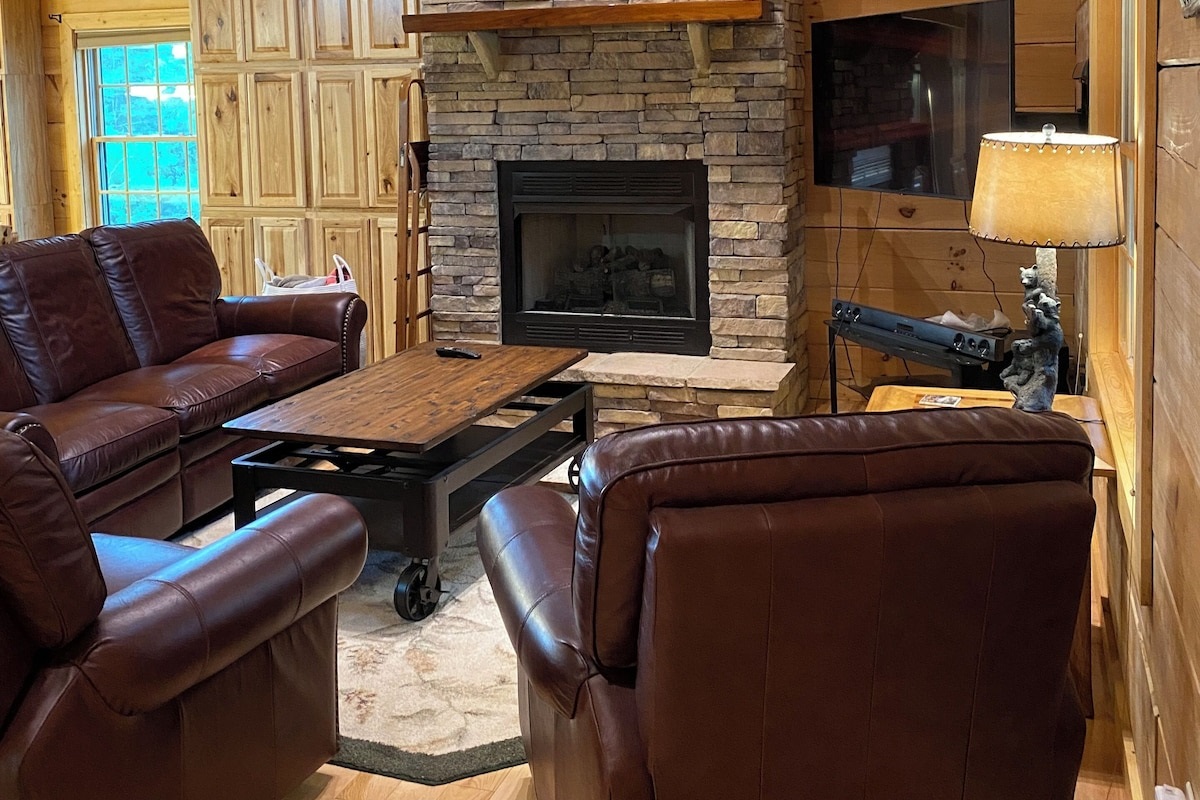 The Living Room has high-quality leather furniture and a coffee table that lifts up as more space to eat on.
