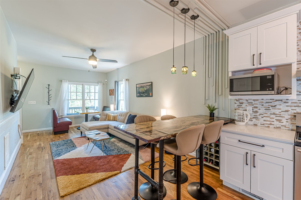 Open-concept design keeps everyone connected—cook, chat, and relax together.