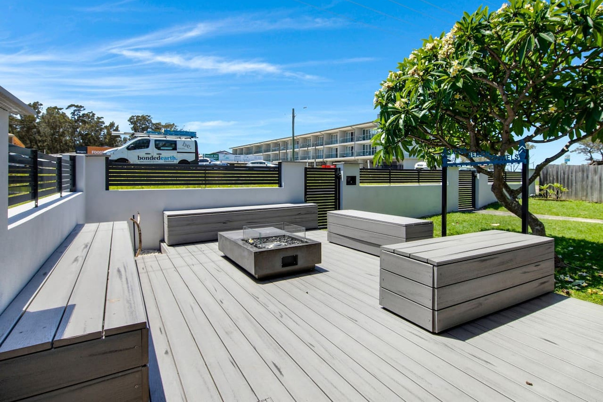 The front bottom deck at Skye’s Beach House Malua Bay adds a lower-level outdoor space on the beach-facing side of the home.