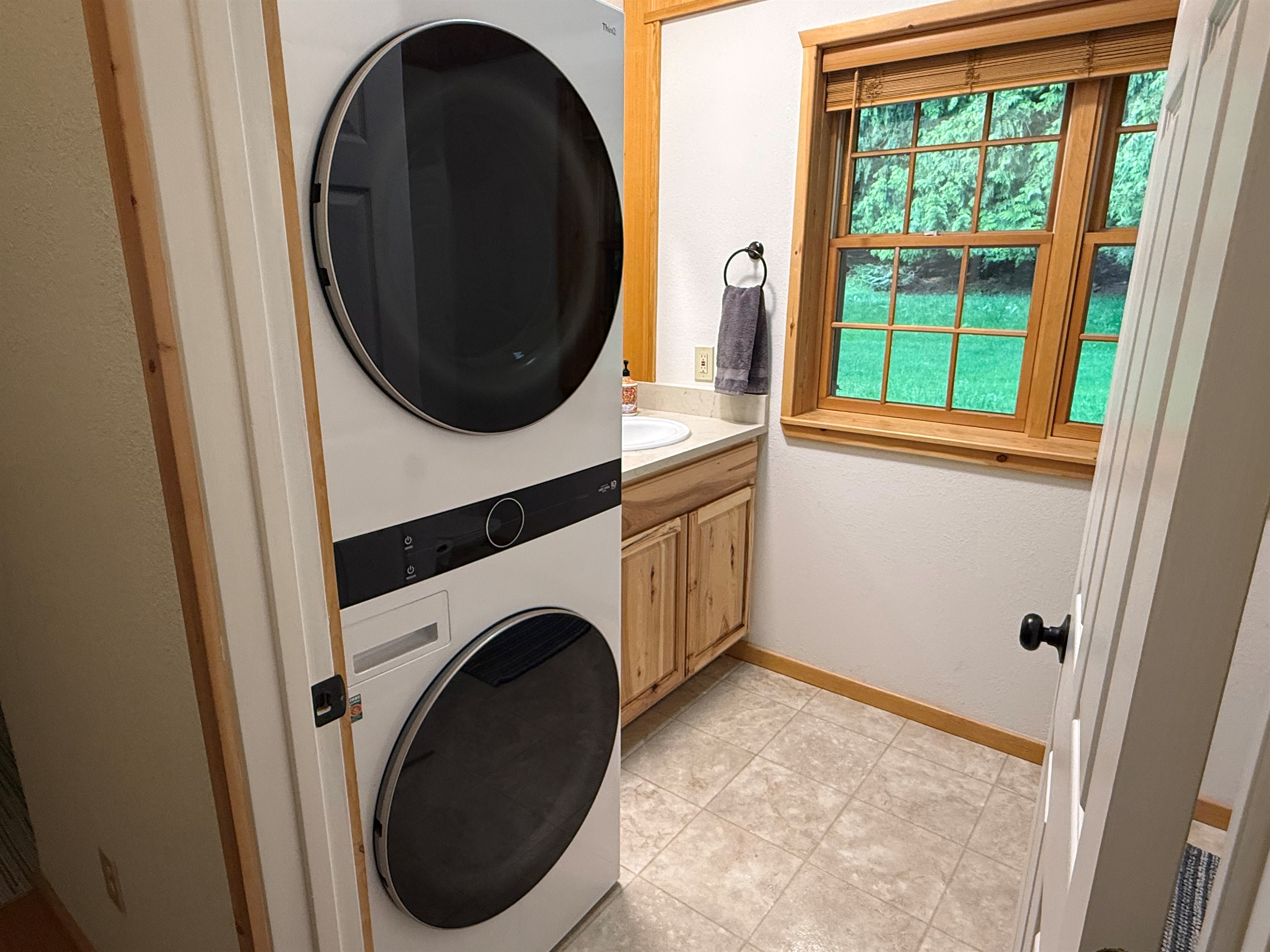 Downstairs guest bathroom with laundry