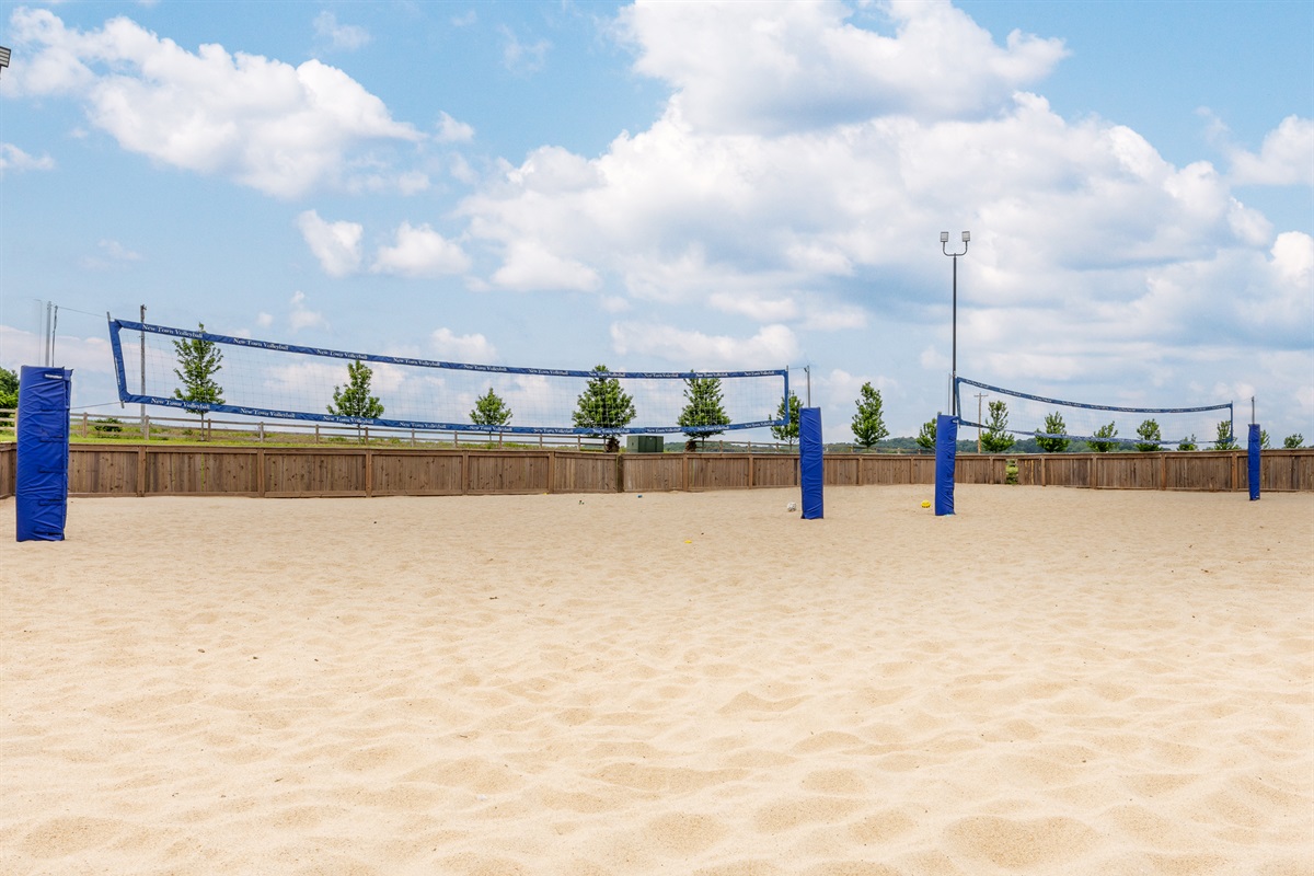 Enjoy the community sand volleyball court, perfect for a casual game with friends or an afternoon in the sun just steps from the neighborhood green spaces.