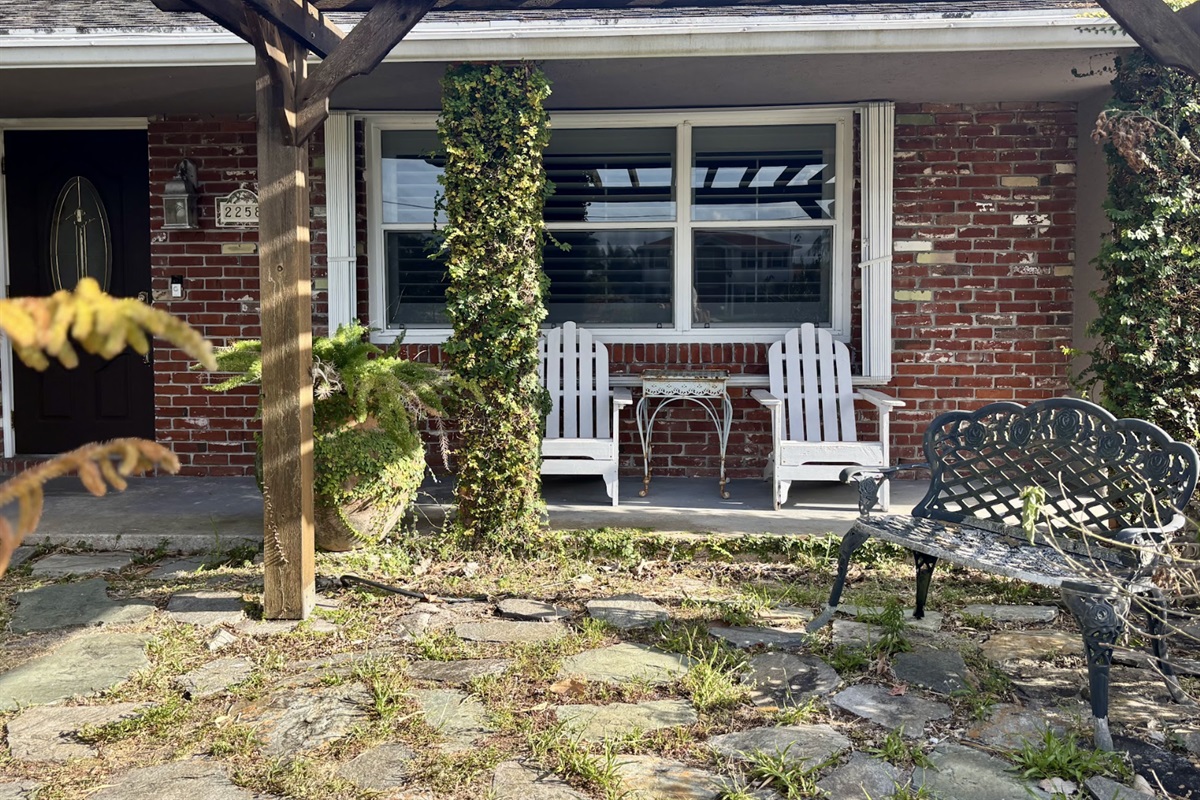 Enjoy time outside under the pergola, surrounded by a garden and fountains.