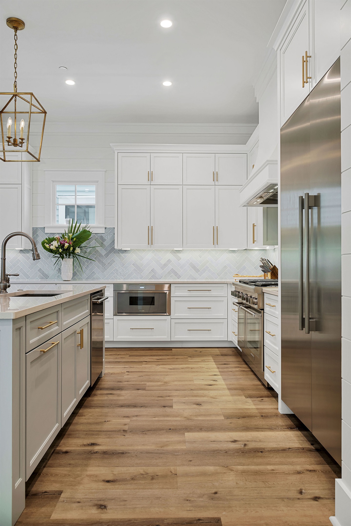 A large kitchen allows plenty of space for cooking and meal prep.