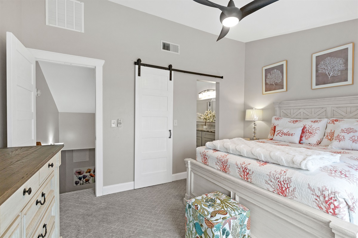 Spacious queen suite with ensuite bath and hallway access