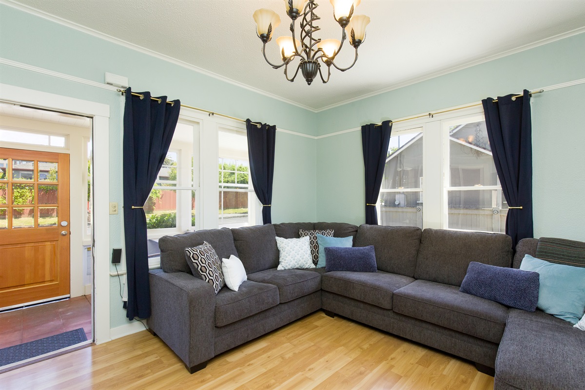 Spacious living room with comfortable couch and smart TV