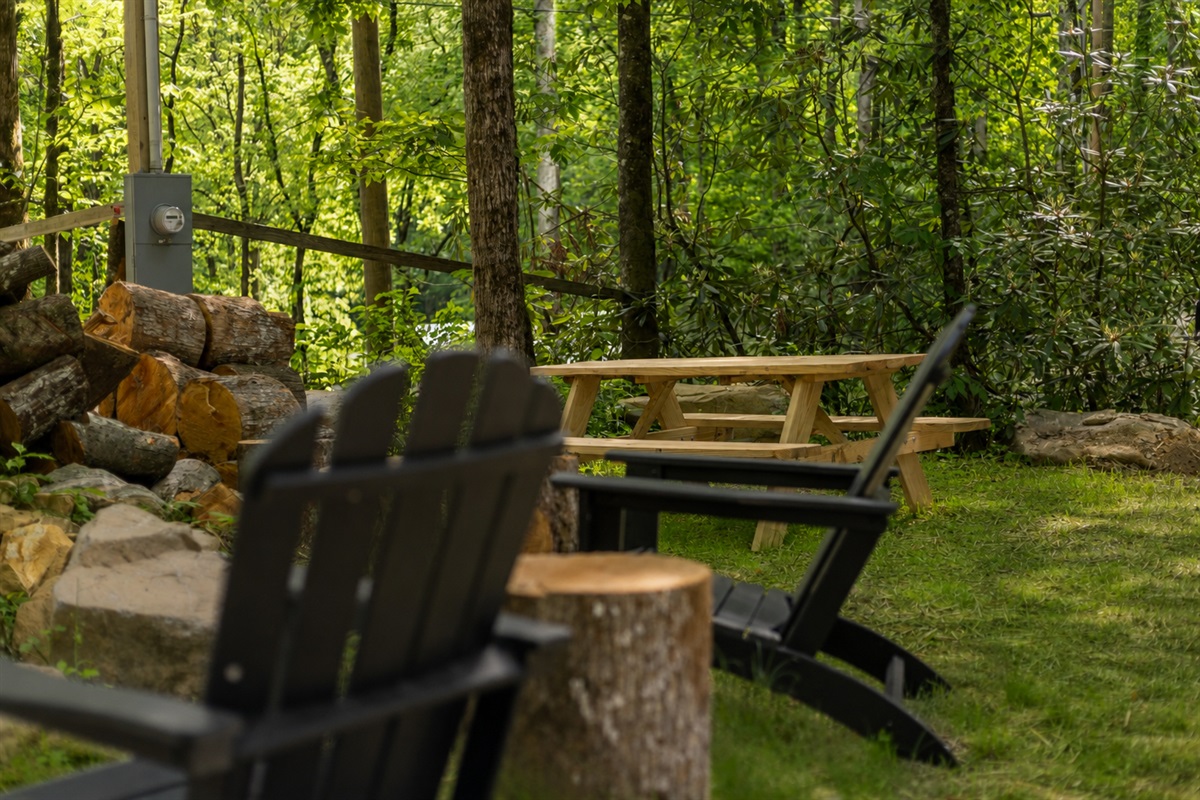 Enjoy outdoor dining and relaxing evenings surrounded by peaceful wooded views.
