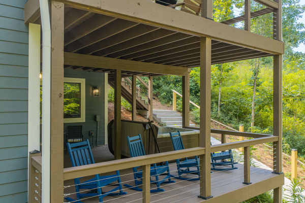 Lower level deck seating area and hot tub