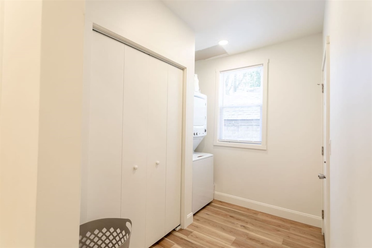 Spacious laundry area, providing plenty of room for your laundry needs.