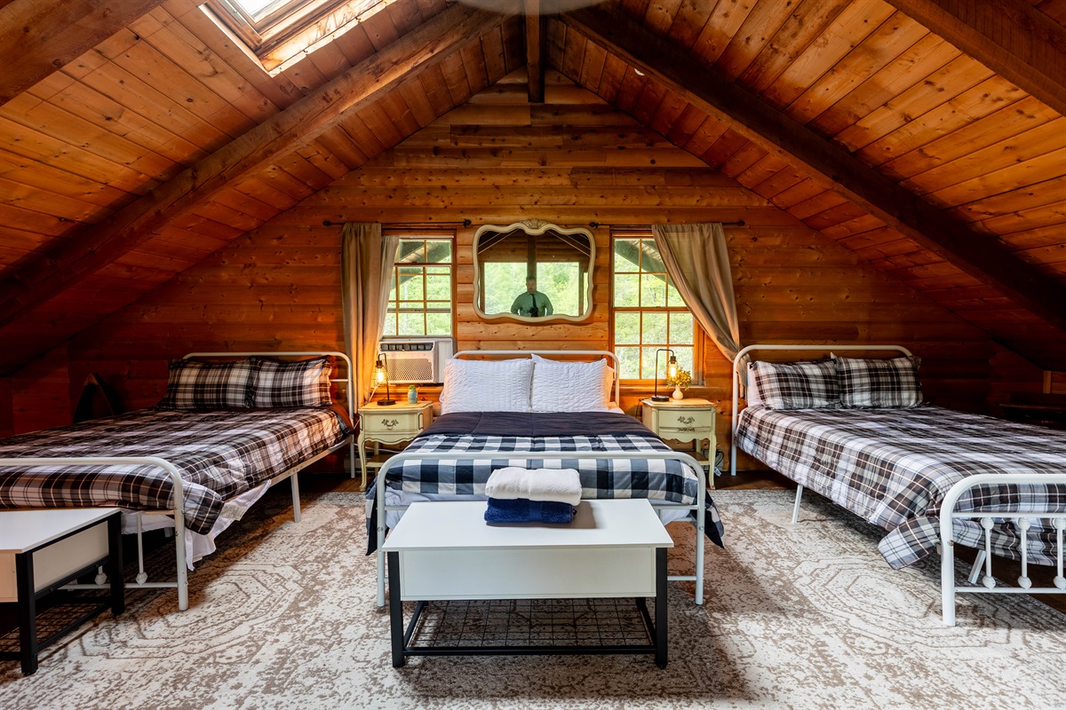 Find three queen-size beds in our loft, and peek at the night sky through the skylight window!