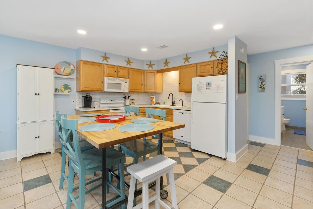 Your updated kitchen with bar seating is a place you actually want to hang out in &mdash; morning coffee never tasted so good.