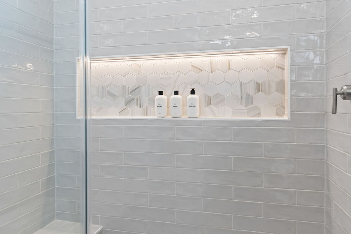 King suites each include a luxurious tiled shower with spa-like rain shower heads & built-in lighted niches with plenty of space for your favorite products. For your convenience, shampoo, conditioner, and body wash are provided. 