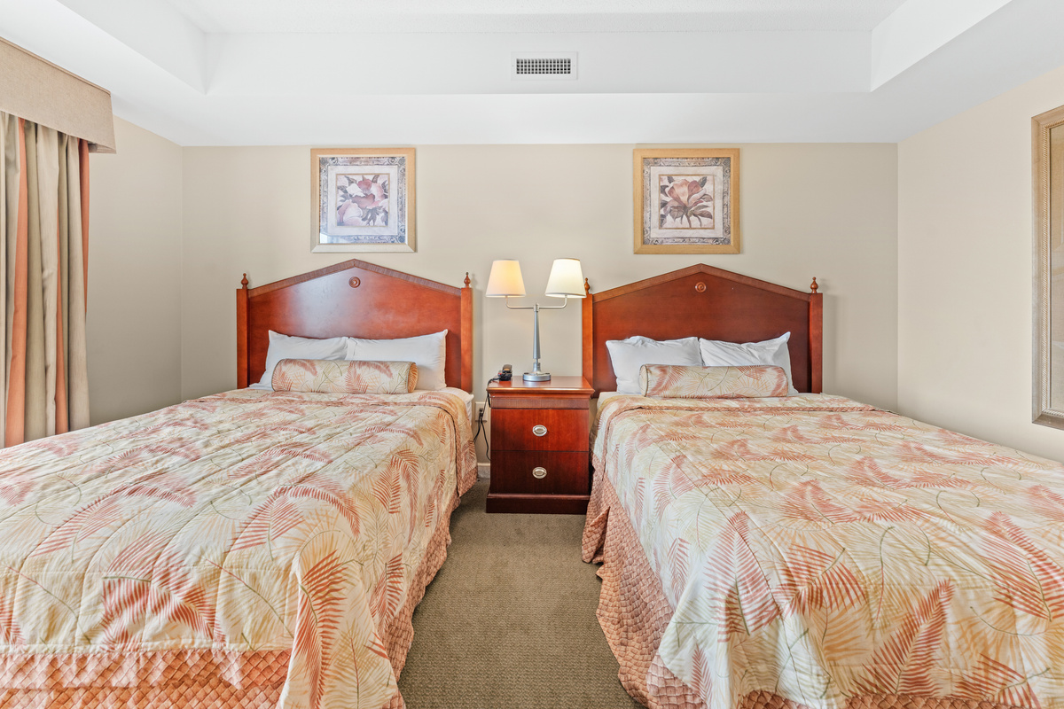 2nd Bedroom with 2 queen beds and balcony access
