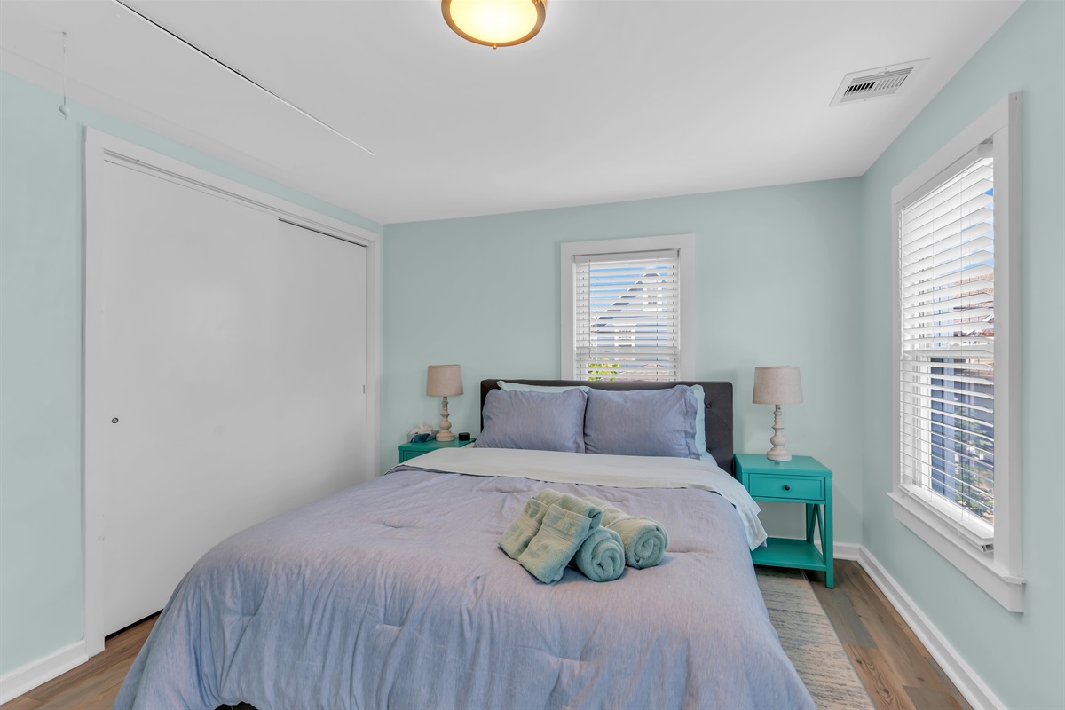 Experience tranquil Jersey Shore mornings in this thoughtfully designed bedroom. Coastal colors, premium bedding, and modern amenities blend seamlessly in our Ocean Grove beach apartment near Asbury Park.