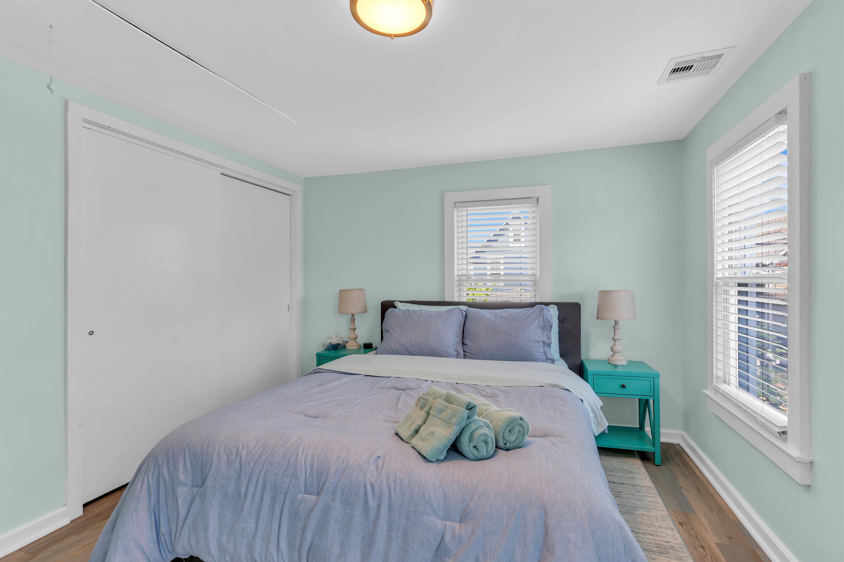 Experience tranquil Jersey Shore mornings in this thoughtfully designed bedroom. Coastal colors, premium bedding, and modern amenities blend seamlessly in our Ocean Grove beach apartment near Asbury Park.