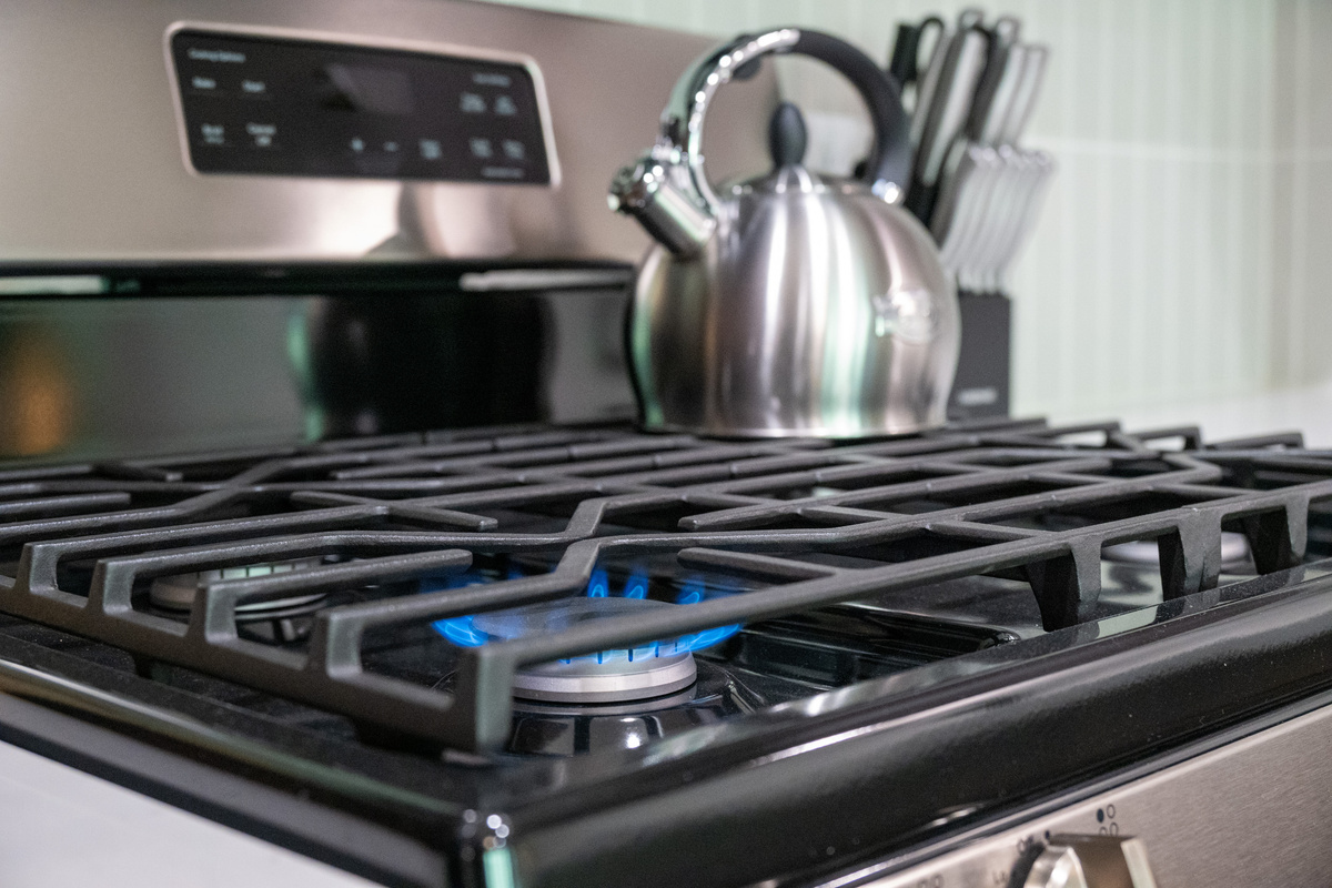 Gas cooktop ready for preparing meals during your stay.