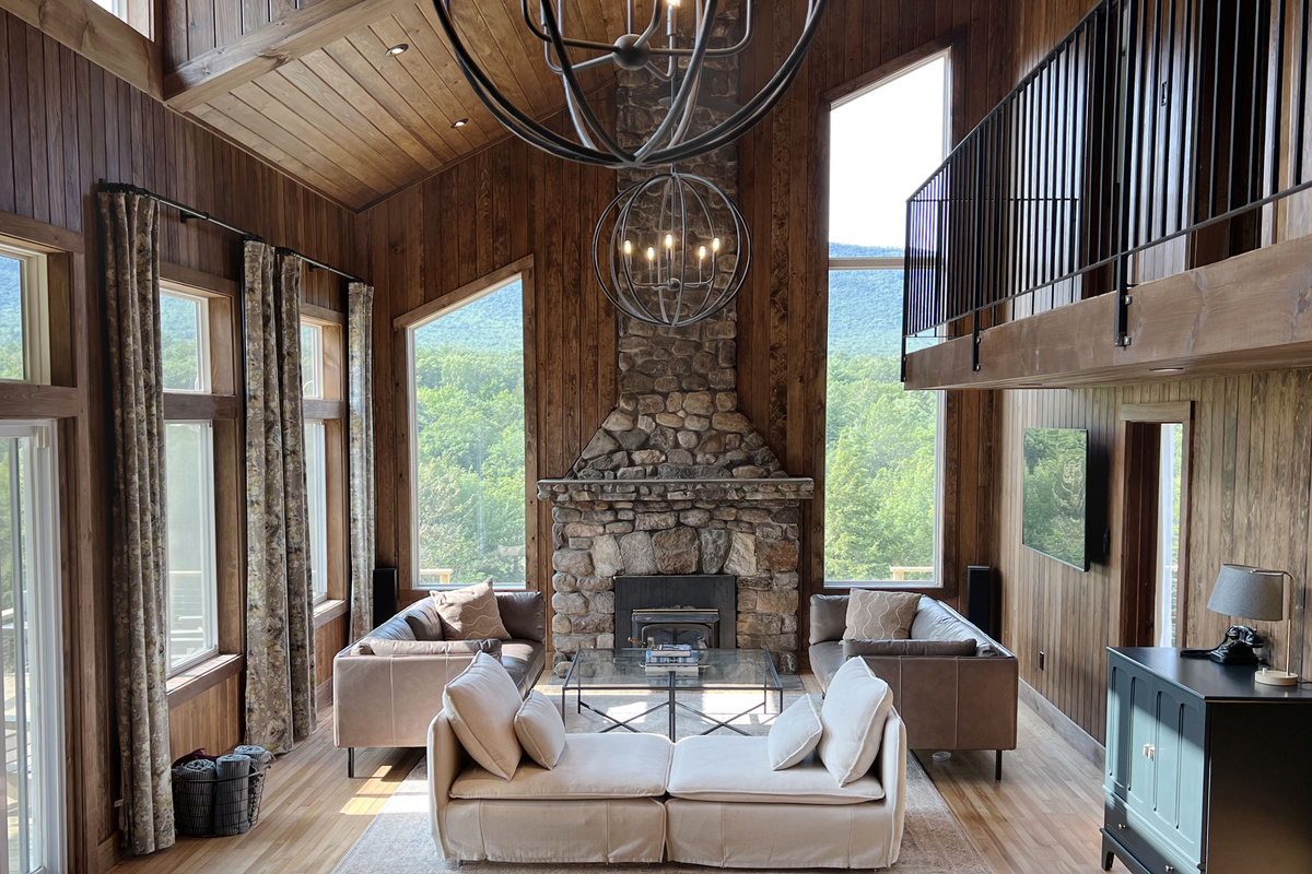Enjoy the views, curl up with a book or use the 65-inch Roku Smart TV in this spacious room.