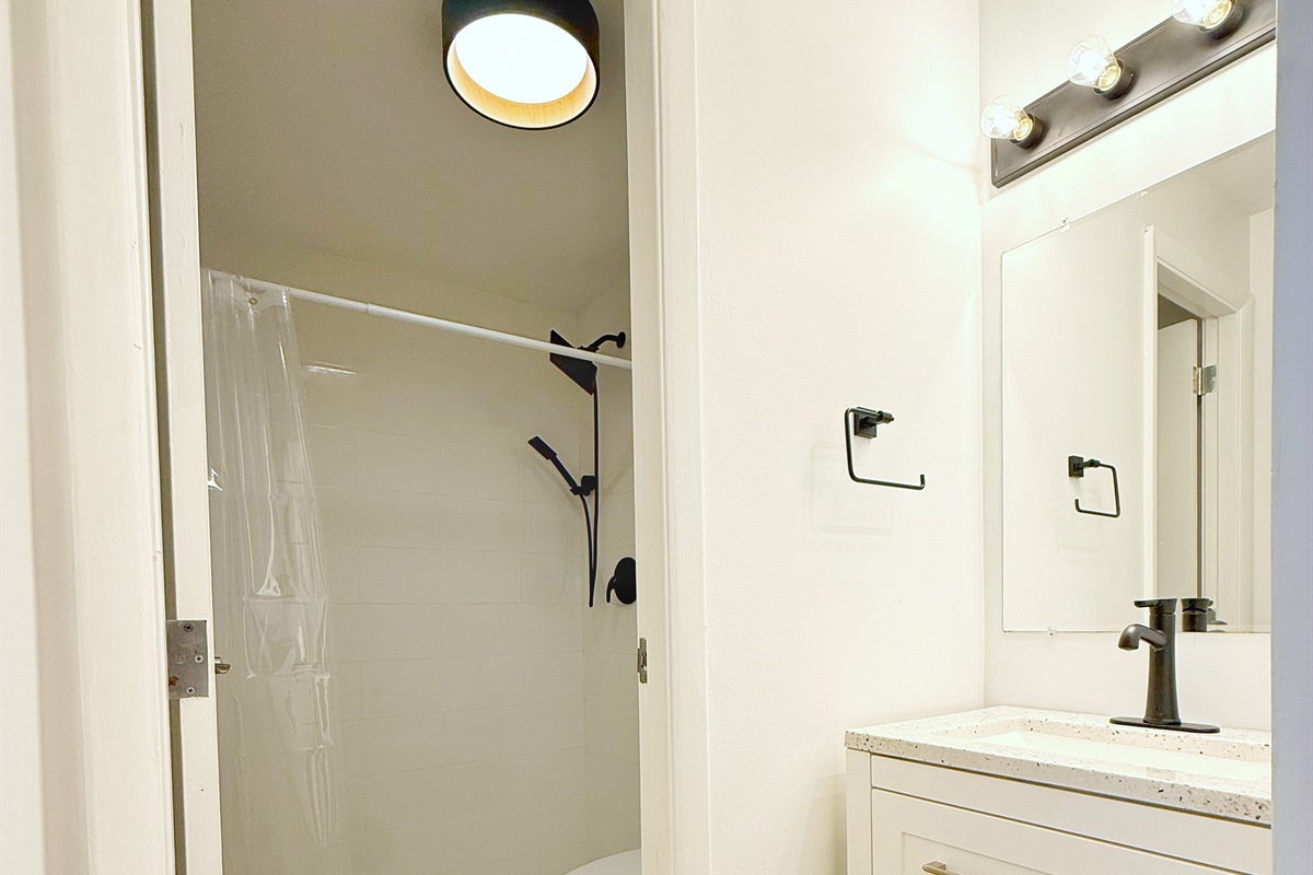 A separate vanity area allows one person to get ready while another person is showering.