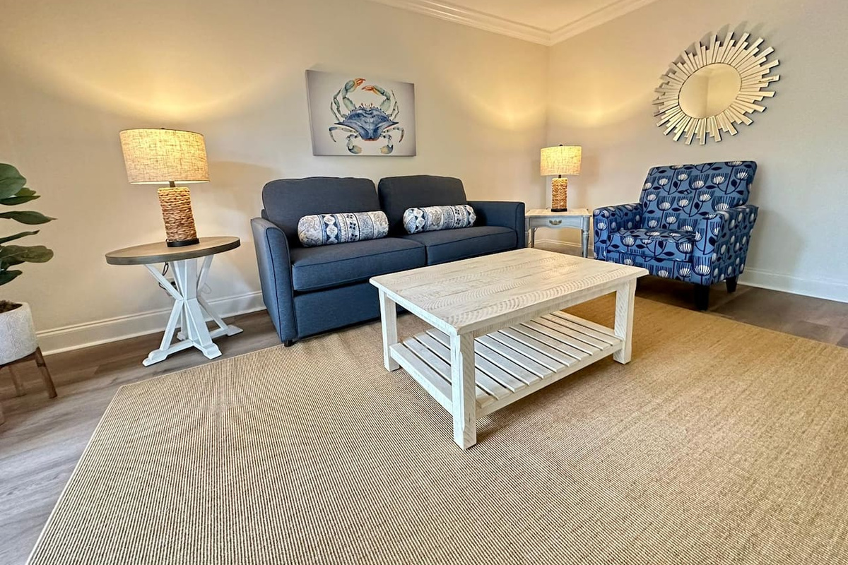 Living room with sofa and armchair