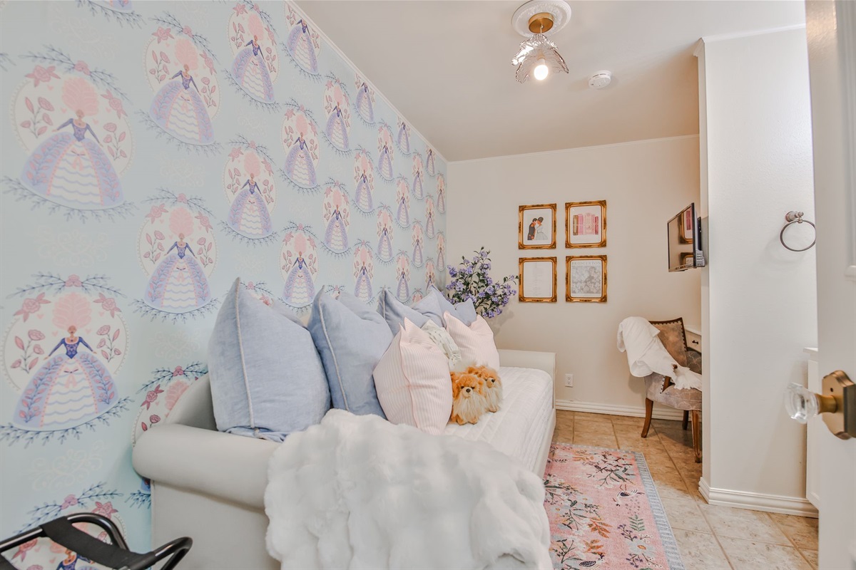 The Queen Charlotte Room: A jewel box of a chamber for the most beloved member of the ton. Featuring a twin bed, smart TV, and in-room toilet and shower—plus a desk for correspondence.